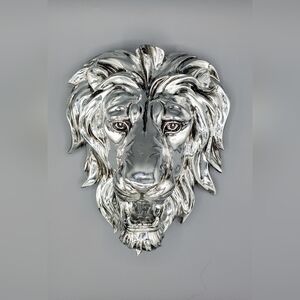 Metallic silver Lion head hanging wall decor.  9"x7"